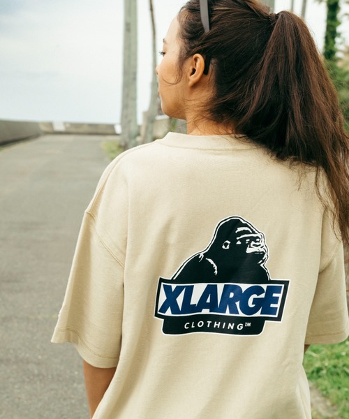 Champion(チャンピオン)の「XLARGE×Champion S/S TEE(Tシャツ/カットソー・メンズ・アッシュ/ブラック/ベージュ/ネイビー・S/M/L/XL)」の1枚目の写真