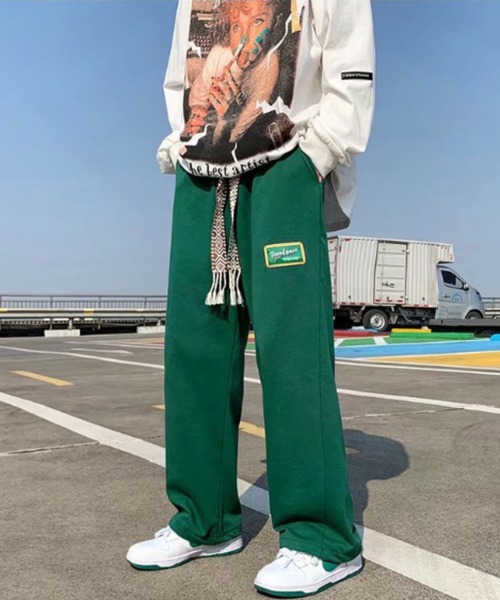 MGV(エムジーヴィー)の「腰ひもワンポイントストレートパンツ(スラックス・メンズ・ブラック/グリーン・MEDIUM/LARGE/X-LARGE)」の1枚目の写真