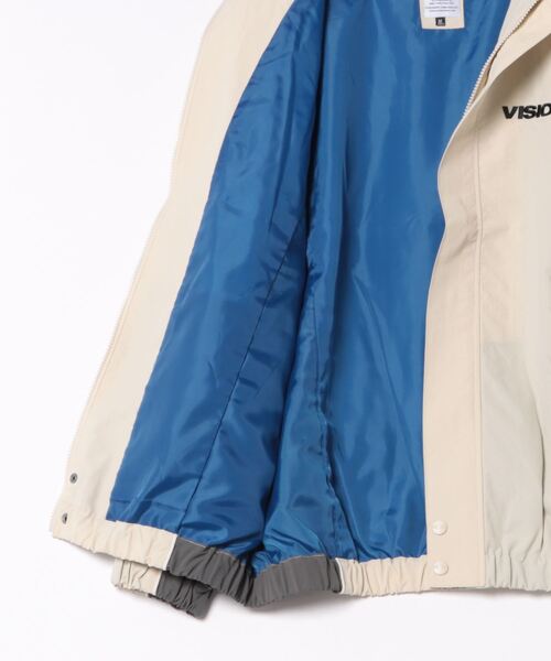 VISION STREET WEAR(ヴィジョンストリートウェア)の「【VISION STREET WEAR】ラグラントラックジャケット / ナイロンジャケット(ナイロンジャケット・レディース・アイボリー/ブラック/オリーブ/パープル・MEDIUM/LARGE/X-LARGE)」の6枚目の写真