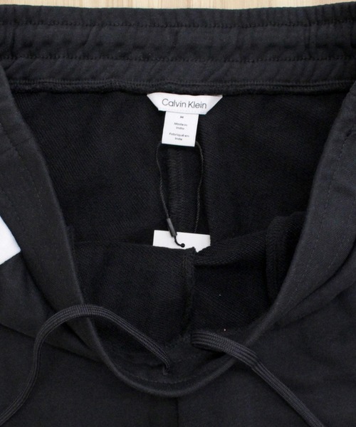 Calvin Klein（カルバン・クライン）の「CK アイコニックカーブ シームジョガーパンツ ICONIC CURVED SEAM JOGGER（スウェットパンツ・メンズ・ブラック・M/L/XL）」の5枚目の写真