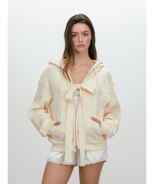 MOIFAIRE(モイフェア)の「RIBBON WAFFLE HOODIE / BUTTER(パーカー・レディース・ライトイエロー・OS)」の1枚目の写真