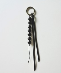 stan（スタン）の「stone & leather tie charm（チャーム）」