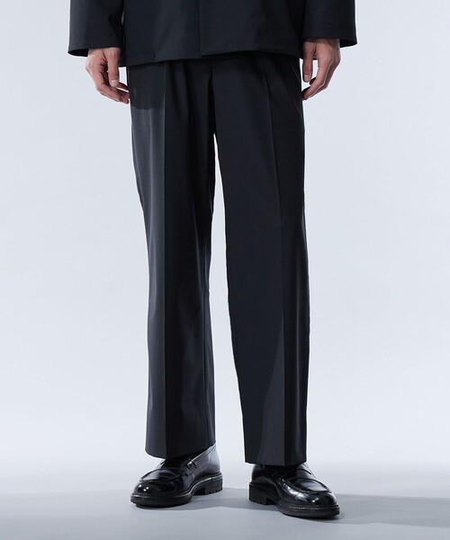 UNITED TOKYO(ユナイテッドトウキョウ)の「ELASTIC WOOL ストレートスラックス | セットアップ着用可能(スラックス・メンズ・ブラック/ブルー・2/1)」の2枚目の写真