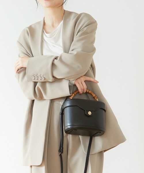 TREASURE TOPKAPI（トレジャートプカピ）の「【雑誌掲載】【TREASURE TOPKAPI】 バンブーハンドル クラシック バニティ バッグ（ハンドバッグ・レディース・オレンジ/ブラウン/ブラック・FREE）」の2枚目の写真