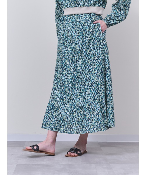 DOLLUPOOPS(ドールアップウップス)の「幾何学柄プリントフレアスカート(スカート・レディース・オレンジ/グリーン・38)」の1枚目の写真