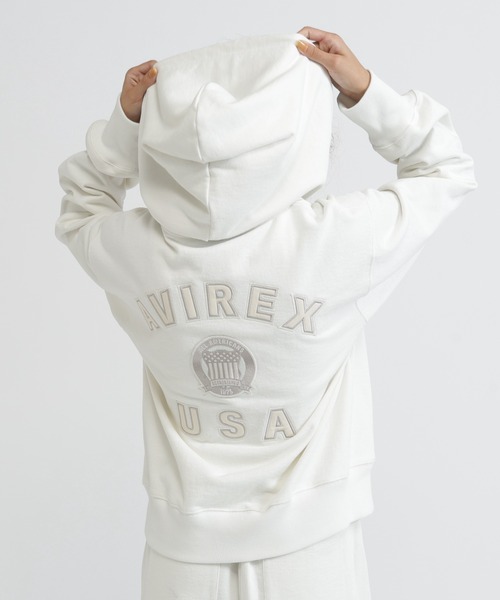 AVIREX(アヴィレックス)の「SIGNATURE VARSITY LOGO ZIP PARKA(パーカー・レディース・オフホワイト/グレー/ブラック・F)」の2枚目の写真
