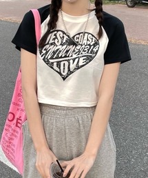 A'GEM/9 × .kom『.kom/ドットケーオーエム』ハートグラフィック クロップド丈 半袖Tシャツ カットソー