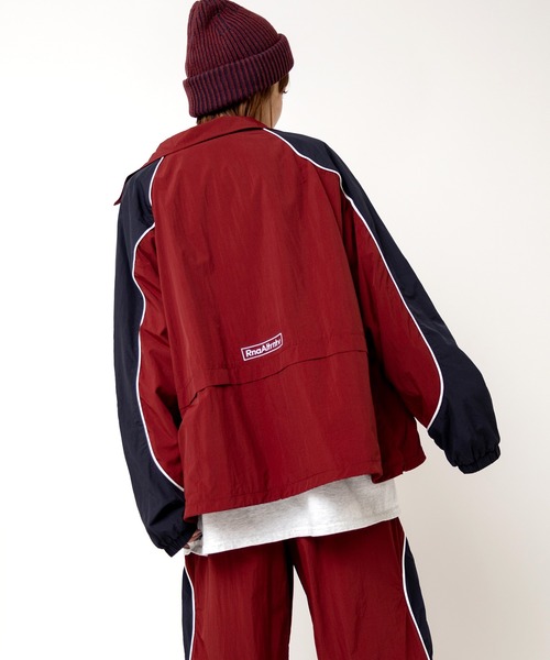 RNA（アールエヌエー）の「J2156 バイカラートラックジャケット（ナイロンジャケット・レディース・バーガンディー/グリーン×オレンジ/ブラック×グレー・MEDIUM）」の10枚目の写真