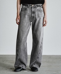 WYM LIDNM（ウィム バイ リドム）の「VINTAGE WASHED CURVED DENIM（デニムパンツ）」