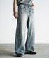 WYM LIDNM（ウィム バイ リドム）の「VINTAGE WASHED CURVED DENIM（デニムパンツ・M）」