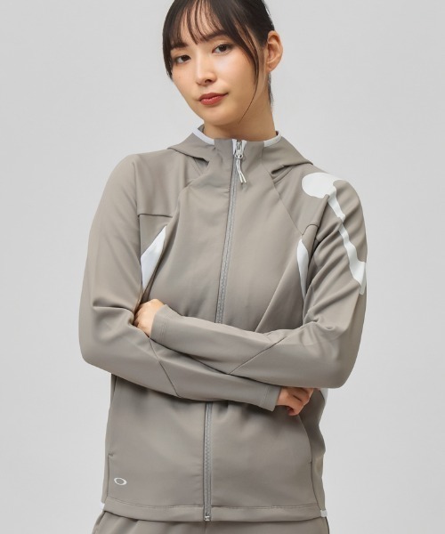 OAKLEY(オークリー)の「オークリー OAKLEY RADIANT 3RDG SYNCHRONISM JACKET 12.0(ジャージ・レディース・ホワイト/ブラック/ベージュ・L/M)」の1枚目の写真