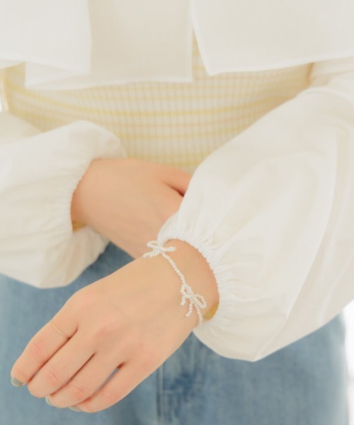 flower（フラワー）の「タイニーリボンブレスレット（ブレスレット・レディース・ホワイト・FREE）」の2枚目の写真