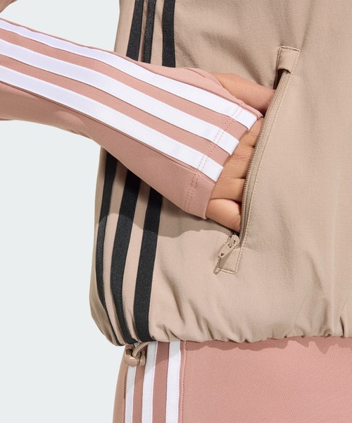 adidas(アディダス)の「アディレニウム5.0 ノースリーブ トラックトップ / トラックジャケット / ジャージ / アディダスオリジナルス adidas Originals(ジャージ・レディース・ブラウン・XX-LARGE/LARGE/MEDIUM/SMALL/X-LARGE/X-SMALL)」の4枚目の写真