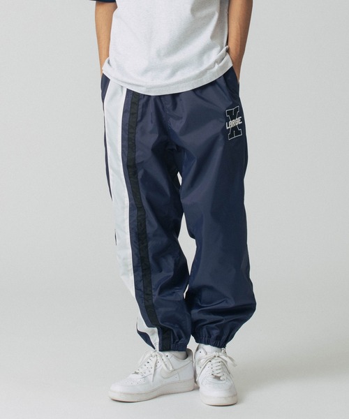 【セール】TWO LINE TRACK PANTS（その他パンツ）｜XLARGE（エクストララージ）