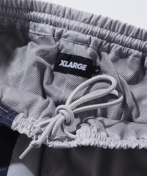 XLARGE(エクストララージ)の「TWO LINE TRACK PANTS(その他パンツ・メンズ・ブラック/グレー/ネイビー・S/M/L/XL)」の5枚目の写真