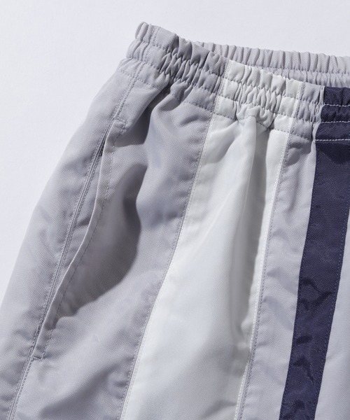 XLARGE(エクストララージ)の「TWO LINE TRACK PANTS(その他パンツ・メンズ・ブラック/グレー/ネイビー・S/M/L/XL)」の6枚目の写真