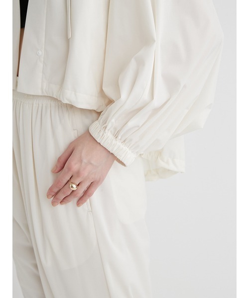 emmi（エミ）の「eco ラッシュガードポンチョフーディー（ナイロンジャケット・レディース・ブラック/オフホワイト・FREE）」の10枚目の写真