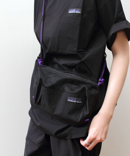 THOUSAND MILE（サウザンドマイル）の「THOUSAND MILE / サウザンドマイル　ショートスリーブセットアップ(Tシャツ・パンツ・ポーチ　セット）（Tシャツ/カットソー・メンズ・ブラック/ネイビー・S/L/M）」の11枚目の写真