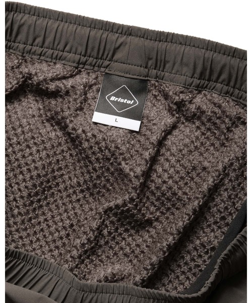 F.C.Real Bristol（エフシーレアルブリストル）の「THERMAL-LINING TRACK PANTS（その他パンツ・メンズ・ブラック/カーキ・SMALL/MEDIUM/LARGE/X-LARGE/XX-LARGE）」の9枚目の写真