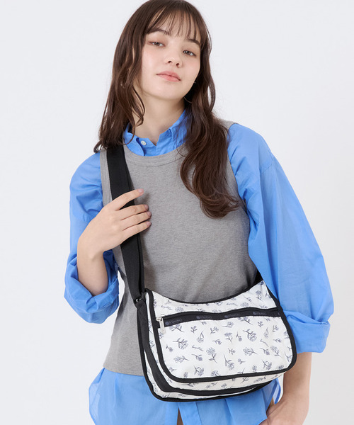 LeSportsac(レスポートサック)の「CLASSIC HOBO インクスケッチドフローラルアイボリー(ショルダーバッグ・レディース・ホワイト・FREE)」の1枚目の写真