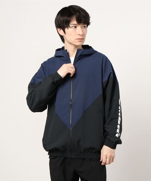 UMBRO（アンブロ）の「アンブロ UMBRO HE クロスジヤケツト（その他アウター・メンズ・オレンジ/ネイビー/ブラック×グリーン・SS/S/M/L）」の2枚目の写真