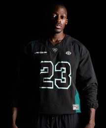 MUSCLE ARMED（マッスルアームド）の「ARMED 23 WOVEN スウェット [ブラック/グリーン]（スウェット）」