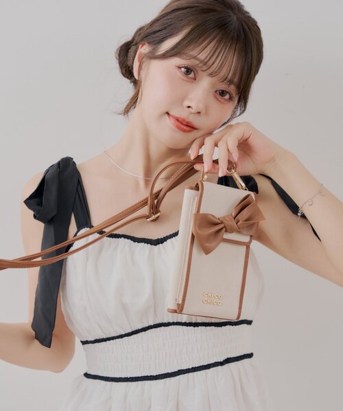 Chico(チコ)の「【トラベルグッズ】リボントラベルマルチショルダー(ショルダーバッグ・レディース・ホワイト系その他2/ネイビー/ホワイト系その他・FREE)」の2枚目の写真