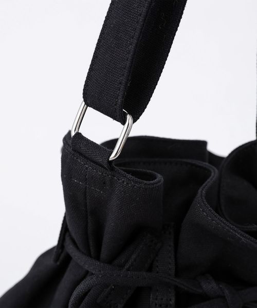 one after another NICE CLAUP（ワンアフターアナザーナイスクラップ）の「ロゴ入り巾着バッグ（ショルダーバッグ・レディース・オフホワイト/ブラック/アイボリー/パープル・FREE）」の6枚目の写真