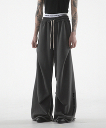 FANSHOW（ファンショー）の「SIX COLON NINETEEN GEOMETRY PANTS - PIGMENT BLACK（スウェットパンツ）」