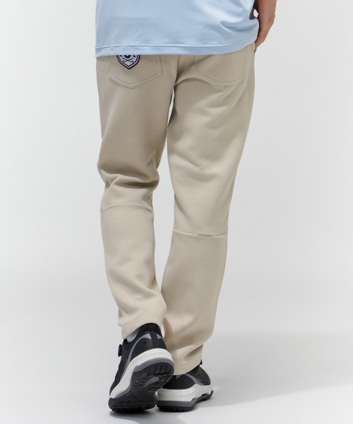 adidas(アディダス)の「アディダス adidas バックグラフィックアンクルパンツ(スラックス・メンズ・ベージュ/ネイビー/グレー・76cm/79cm/82cm/85cm/88cm/92cm/96/100cm)」の5枚目の写真