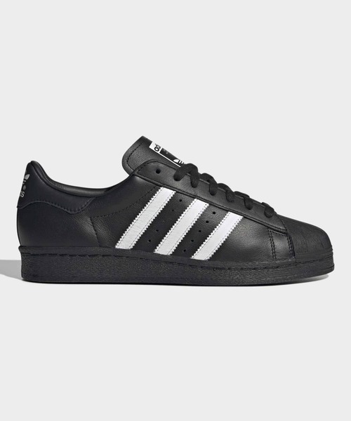 adidas(アディダス)の「スーパースター 82 / Superstar 82 / アディダスオリジナルス adidas Originals(スニーカー・メンズ・ブラック・22.0cm/22.5cm/23.0cm/26.5cm/28.0cm/27.5cm/27.0cm/28.5cm/23.5cm/29.0cm/24.5cm/24.0cm/26.0cm/25.5cm/25.0cm)」の1枚目の写真