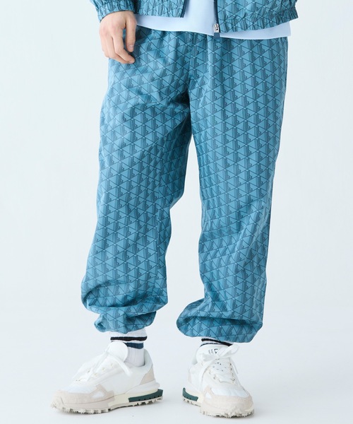 LACOSTE - タグ付未使用品✨ラコステ ジョガーパンツ スウェットパンツ 青 ブルー US S セール】モノグラムジャカード撥水トラックパンツ（スウェット