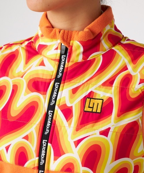Loudmouth（ラウドマウス）の「LOUDMOUTH ラウドマウス ゴルフウェア 中綿入り ストレッチ 総柄 ハイネック フルジップ フリースベスト（ベスト・レディース・オレンジ系その他/ホワイト系その他・LL/L/M/S）」の13枚目の写真