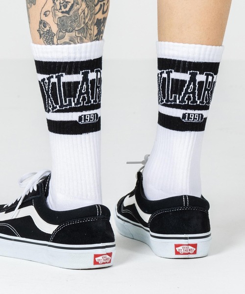 XLARGE（エクストララージ）の「COLLEGE LOGO SOCKS（ソックス/靴下・メンズ・ホワイト/ネイビー/グリーン・ONE SIZE）」の2枚目の写真