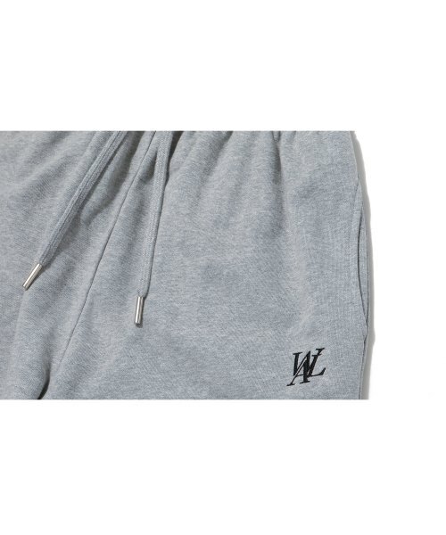 WOOALONG（ウアロン）の「Signature relax wide pants - GREY（スウェットパンツ・レディース・ライトグレー・LARGE/MEDIUM/SMALL）」の6枚目の写真