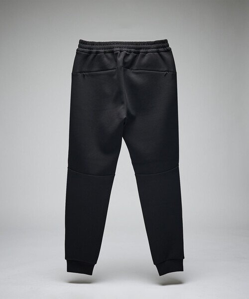 DESIGNWORKS(デザインワークス)の「【セットアップ対応】液アンダンボール トレーニングパンツ(スラックス・メンズ・ネイビー/ブラック・46/48/50)」の4枚目の写真