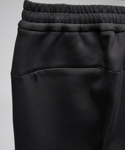DESIGNWORKS(デザインワークス)の「【セットアップ対応】液アンダンボール トレーニングパンツ(スラックス・メンズ・ネイビー/ブラック・46/48/50)」の8枚目の写真