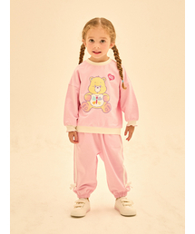 CAREBEARS（ケアベア）の「カーミングハートベアリボンオーバーサイズ上下セット（セットアップ）」