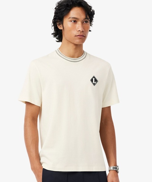 LACOSTE(ラコステ)の「フランスメイド レトロパッチリンガーネックTシャツ(Tシャツ/カットソー・メンズ・オフホワイト/ライトブルー・2/3/4/5)」の1枚目の写真