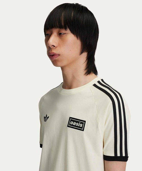 adidas Originals × Oasis ツアースリーストライプス Tシャツ