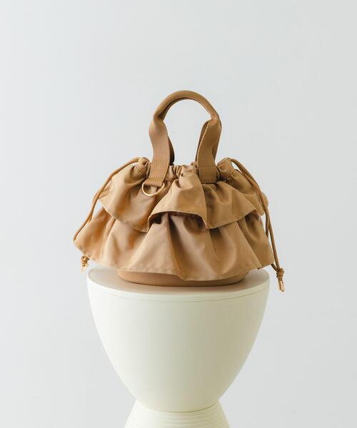 RODE SKO(ロデスコ)の「軽量フリルキンチャクバッグ(ハンドバッグ・レディース・ベージュ/ブラウン/ブラック・ONE)」の1枚目の写真