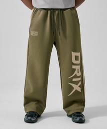 DRIX（ドリックス）の「Track Line Graphic Wide Sweatpants_Khaki（スウェットパンツ）」