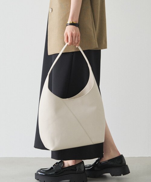 russet（ラシット）の「スムースレザートートバッグ（トートバッグ・レディース・アイボリー/ブラック・FREE）」の2枚目の写真