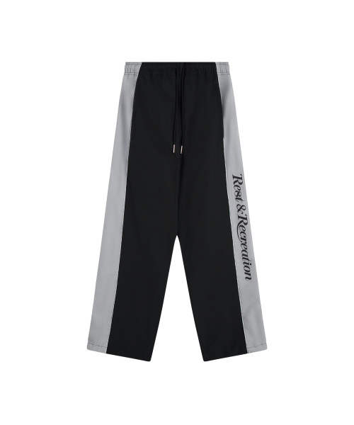 Rest&Recreation(レストアンドレクリエーション)の「NYLON TRACK PANTS - BLACK(スウェットパンツ・メンズ・その他・ONE)」の1枚目の写真