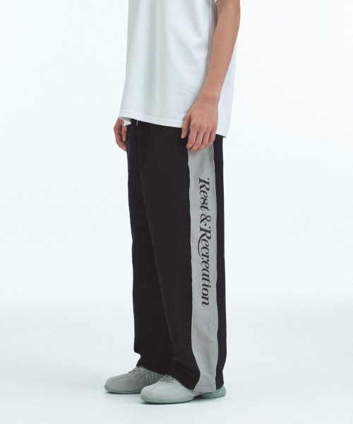 Rest&Recreation(レストアンドレクリエーション)の「NYLON TRACK PANTS - BLACK(スウェットパンツ・メンズ・その他・ONE)」の5枚目の写真