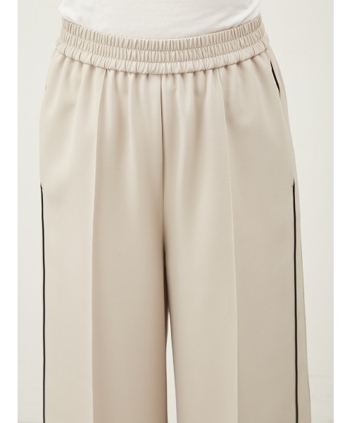 Mila Owen（ミラオーウェン）の「ウエストゴムパイピングラインジャージパンツ（その他パンツ・レディース・ベージュ/ネイビー/ブラック・0/1）」の7枚目の写真