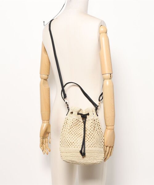 Ritzy（リッツィー）の「ストロー巾着かごバッグ ショルダーバッグ（かごバッグ・レディース・アイボリー/ベージュ・FREE）」の5枚目の写真