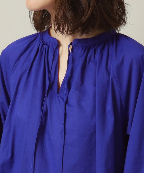 ITS'DEMO(イッツデモ)の「◆【薄手/腰回りカバー/袖口ゴム/手洗い可】スキッパーチュニック(シャツ/ブラウス・レディース・オフホワイト/オレンジ/ブルー/ネイビー・00)」の6枚目の写真