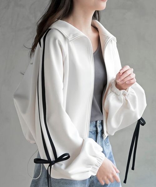 rps(アールピーエス)の「リボンライントラックジャケット(ブルゾン・レディース・アイボリー/ブラック・フリー)」の2枚目の写真