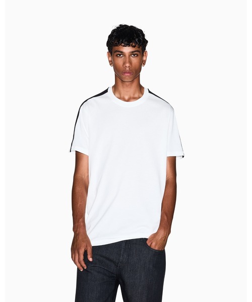 ARMANI EXCHANGE(アルマーニエクスチェンジ)の「【A|X アルマーニ エクスチェンジ】ロゴテープ 半袖クルーネックTシャツ/REGULAR(Tシャツ/カットソー・メンズ・ブラック/オフホワイト・XX-LARGE/LARGE/X-LARGE/X-SMALL/MEDIUM/SMALL)」の1枚目の写真
